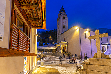 View of Church of Saint Pantalon and Piazza Abbé Henry at dusk, Courmayeur, Aosta Valley, Italy, Europe