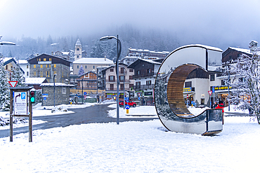 View of C di Courmayer and the snow covered town centre in winter, Courmayeur, Aosta Valley, Italy, Europe