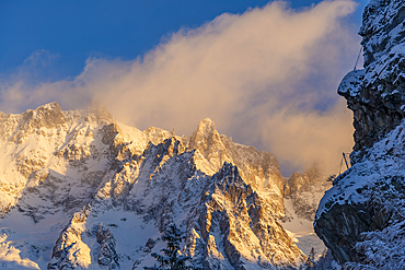 View of snow covered mountains from Courmayeur at sunrise during winter, Courmayeur, Aosta Valley, Italy, Europe