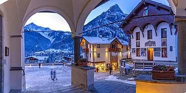 View of Piazza Abbé Henry from Church of Saint Pantalon at dusk, Courmayeur, Aosta Valley, Italy, Europe