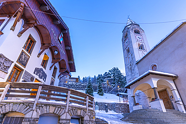 View of Church of Saint Pantalon in Piazza Abbé Henry at dusk, Courmayeur, Aosta Valley, Italy, Europe