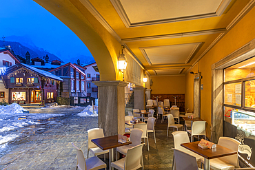 View of snow covered town centre on Via Roma in Courmayeur during winter, Courmayeur, Aosta Valley, Italy, Europe