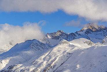 View of snow covered Aosta Valley and mountains from Pavillon du Mont Fréty in winter, Courmayeur, Aosta Valley, Italy, Europe