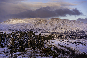 View of continental drift between the North American and Eurasian tectonic plates in Thingvellir National Park during winter, Western Region, Iceland, Europe