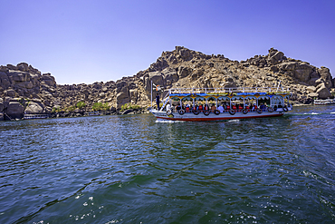 Onboard boat trip to at Temple at Philae on a sunny day, Aswan, Nubia, Egypt, North Africa, Africa
