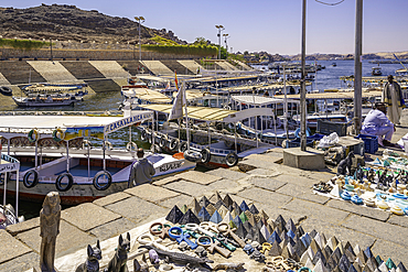 View of souvenirs on display at Temple at Philae on a sunny day, Aswan, Nubia, Egypt, North Africa, Africa