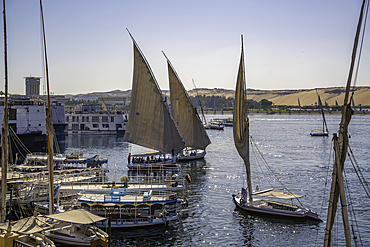 View of fellucas on the Nile river on a sunny day, Aswan, Nubia, Egypt, North Africa, Africa
