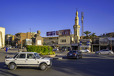 View of buildings on the Nile river promenade on a sunny day, Aswan, Nubia, Egypt, North Africa, Africa