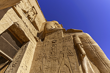Exterior view of relief mural of Ebsambul or Isambul at the Abu Simbel Temple next to Lake Nasser, Temple of the Pharaohs, Ramses II, Nubia, Egypt, Africa
