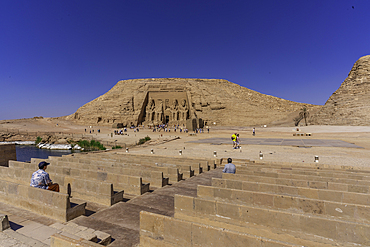 Exterior view of tourists and massive sculptures at the Abu Simbel Temple next to Lake Nasser, Temple of the Pharaohs, Ramses II, Nubia, Egypt, Africa