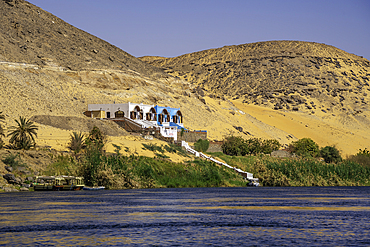 View of architecture on the Nile river from small boat in Aswan, Aswan, Nubia, Egypt, North Africa, Africa