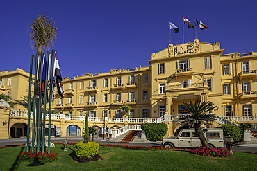 View of the Winter Palace Hotel on the corniche in Luxor on a sunny day, Luxor, Egypt, Africa
