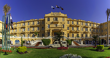 View of the Winter Palace Hotel on the corniche in Luxor on a sunny day, Luxor, Egypt, Africa