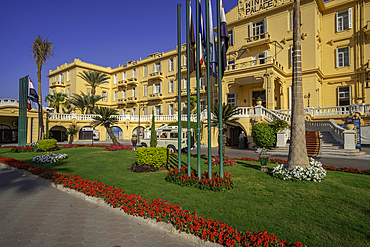 View of the Winter Palace Hotel on the corniche in Luxor on a sunny day, Luxor, Egypt, Africa