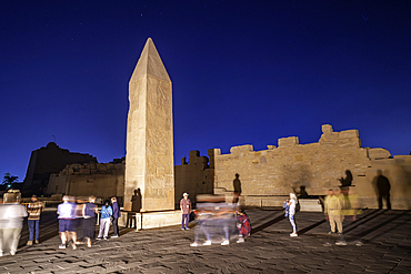 View of Karnak Temple sound and light show at dusk, Luxor, Egypt, Africa