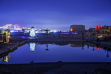 View of Karnak Temple sound and light show at dusk, Luxor, Egypt, Africa