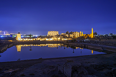 View of Karnak Temple sound and light show at dusk, Luxor, Egypt, Africa