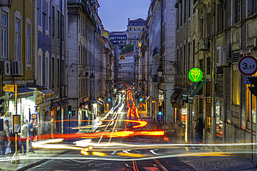 View of traffic and trail lights in hystoric old town centre, Lisbon, Portugal, Europe