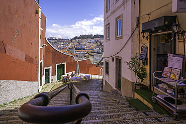View of cafe and steps in Lisbon city centre, Lisbon, Portugal, Europe