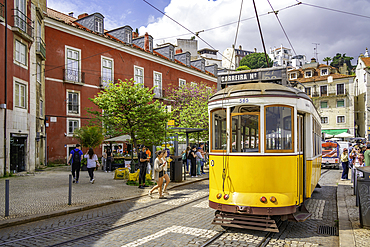 View of vintage tram and colourful architecture in Alfama, Alfama District, Lisbon, Portugal, Europe