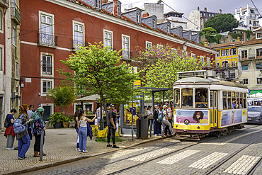 View of vintage tram and colourful architecture in Alfama, Alfama District, Lisbon, Portugal, Europe