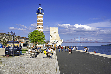 View of Belem Lighthouse and shops and stalls on a sunny day, Lisbon, Portugal, Europe