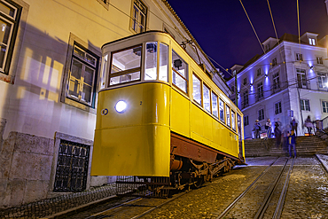 View of vintage Glória Funicular at dusk, hilltop tram ride, Lisbon, Portugal, Europe