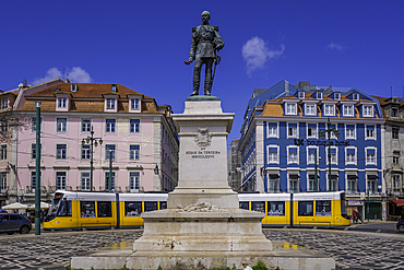 View of Duke of Terceira statue and a modern tram in PC Duque da Terceira on a sunny day, Lisbon, Portugal, Europe