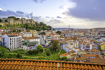 Panoramic view of Lisbon Castle from Miradouro da Senhora do Monte scenic point on a sunny day in the Alfama District, Lisbon, Portugal, Europe