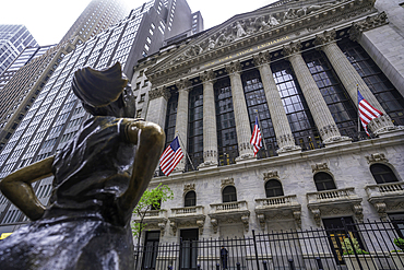 View of exterior of New York Stock Exchange and The Fearless Girl statue in Lower Manhattan, New York City, United States of America, North America