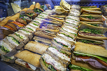 View of deli sandwiches in shop window in Lower Manhattan, New York City, United States of America, North America