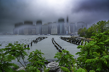 View of Lower Manhattan from Old Pier 1 on a rainy day, Brooklyn Bridge Park, New York City, United States of America, North America