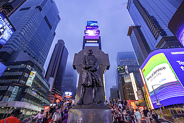 View of neon lights in Times Square at dusk, New York City, United States of America, North America