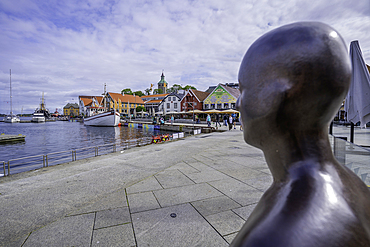 View of sculpture, boats in harbour and Stavanger skyline during daytime, Stavanger, Norway, Scandinavia, Europe