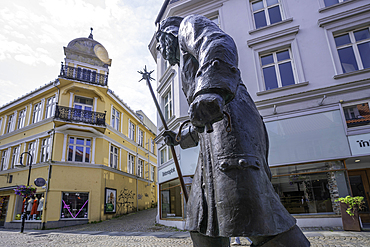 View of Statue Old Time Watchman and shops on Stervag during daytime, Stavanger, Norway, Scandinavia, Europe