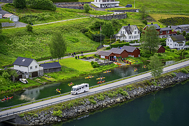 Aerial view of motorhome, watersport and shoreline near Olden village in Nordfjorden during summer, Norway, Scandinavia, Europe