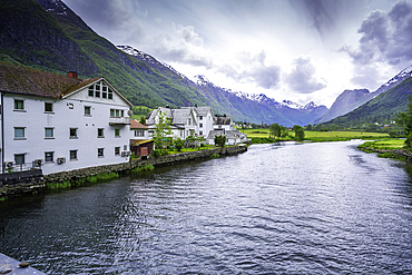 View of Olden village, mountains and Oldeelva river in Nordfjorden during summer, Norway, Scandinavia, Europe
