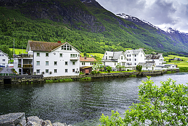 View of Olden village, mountains and Oldeelva river in Nordfjorden during summer, Norway, Scandinavia, Europe