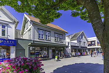 View of shops on Haraldsgata street on a sunny day, Haugesund, Rogaland County, Norway, Scandinavia, Europe