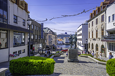 View of Fiskerne statue and buildings on a sunny day, Haugesund, Rogaland County, Norway, Scandinavia, Europe