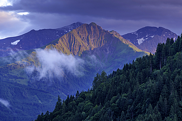 View of rugged mountains from Zell am See during golden hour, Zell am See, Salzburg, Austria, Europe