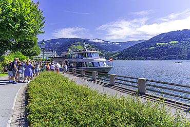 View of tour boat and Lake Zell in Zell am See on a sunny day, Zell am See, Salzburg, Austria, Europe