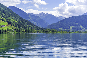 View of mountains and Lake Zell from cruise boat on a sunny day, Zell am See, Salzburg, Austria, Europe