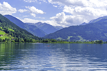 View of mountains and Lake Zell from cruise boat on a sunny day, Zell am See, Salzburg, Austria, Europe