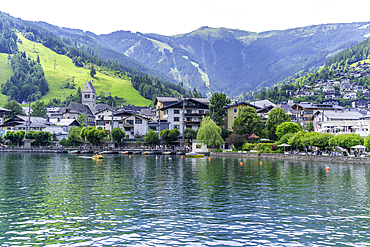 View of the the town and Lake Zell from cruise boat on a sunny day, Zell am See, Salzburg, Austria, Europe