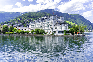 View of the Grand Hotel and Lake Zell from cruise boat on a sunny day, Zell am See, Salzburg, Austria, Europe