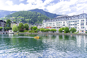 View of the Grand Hotel and Lake Zell from cruise boat on a sunny day, Zell am See, Salzburg, Austria, Europe