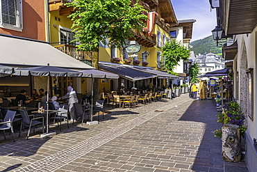View of restaurants in Zell am See on a sunny day, Zell am See, Salzburg, Austria, Europe