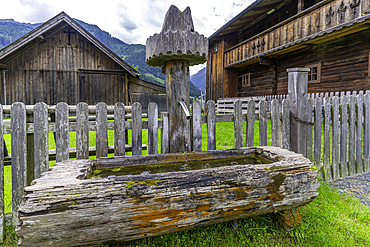 View of wooden water trough at the museum on a sunny day, Kaprun, Salzburg, Austria, Europe