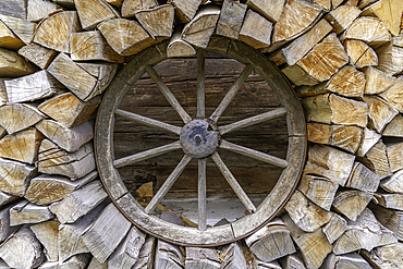 View of wooden wheel at the museum on a sunny day, Kaprun, Salzburg, Austria, Europe